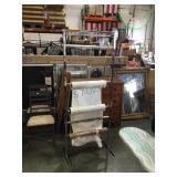 Stand for holding fabrics and plastics. Gaff