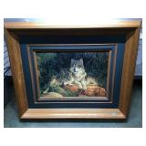 Large framed print of wolves in wooden frame