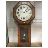 Howard Miller battery op regulator wall clock.