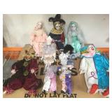 Porcelain jesters & clown dolls.