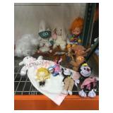 Collection of plushes & dolls.         
Local