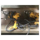 Bottom shelf, tools, a pair of Dewalt drills,