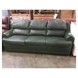 Green sofa hide a bed.     
Local pickup only