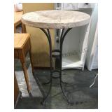 Bar height round metal leg table.         
Local