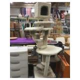 Cat condominium, wobbles on center post, sit