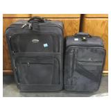 2 Eddie Bauer rolling suitcases.