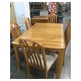 Blonde wooden dining table, w/6 padded chairs,
