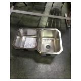 Double kitchen sink one is shallow and the other