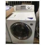 LG front load washing machine with riser stand