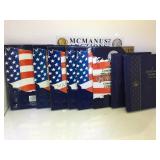 Assorted empty coin albums