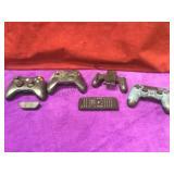 Assorted video game controllers smoke/fire