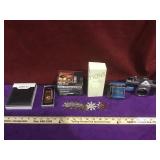 Lot incl. Bulova travel clock, Quattro cologne,