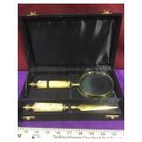 Stone handled brass magnifying glass and letter