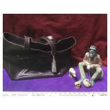 Chalk ware hobo figure with dog and roasting hot