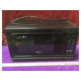 Oster 1350 watt microwave oven model OGM4904