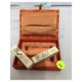 Cased set of Oriental wax Seals, signed , carved