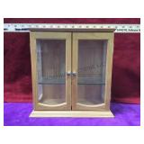 Small wood & glass display.         
Local