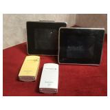 A pair of alarm clocks & wireless thermometers,