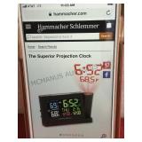 A pair of Hammacher Schlemmer Projection clocks,