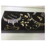 Lot of 2 tiaras ,7 pairs of rhinestone earrings &