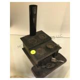 Unusual antique cast iron toy stove, w tools,