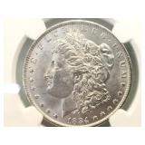 1884-O NGC BRILLANT UNC. MORGAN SILVER DOLLAR