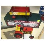 Schilling Tin toy tractor and trailer, mib