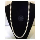 32 in. Strand of 83 cultured pearls, w/ copy of