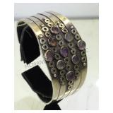 Heavy sterling cuff w/ purple gemstones,