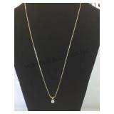 14k gold chain w/ clear gemstone