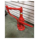 Phillips red hand crank pump for a visible gas