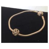 Pandora rose gold bracelet w/ figure 8 charm