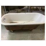 Vintage cast iron claw foot bathtub