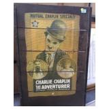 Charlie Chaplin poster mounted on a board,
