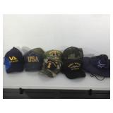Hat collection. Some Las Vegas, some military.