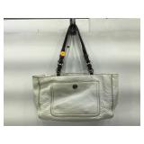 Coach white purse with pocket front.