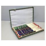 20 cloisonne hairpins in fabric box.