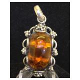 Sterling pendant with amber
