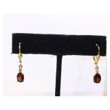 14K Gold earrings with garnets 2g