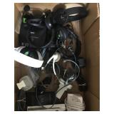 Box of gaming headsets and more.
