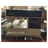 Husqvarna Viking 500 sewing machine with foot