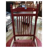 Red wood rocking chair