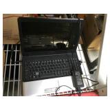 Company laptop powers on working