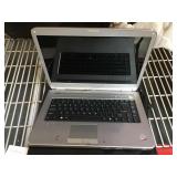 Sony laptop with case powers on. Password locked