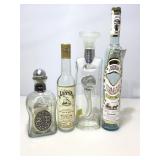 Assorted glass decanters.
