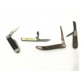 Four vintage pocket knives.