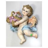 14 in ceramic angel with basket.
