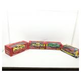 4 die cast model cars.