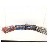 4 metal die cast cars.