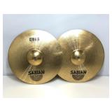 2 Sabian cymbals.